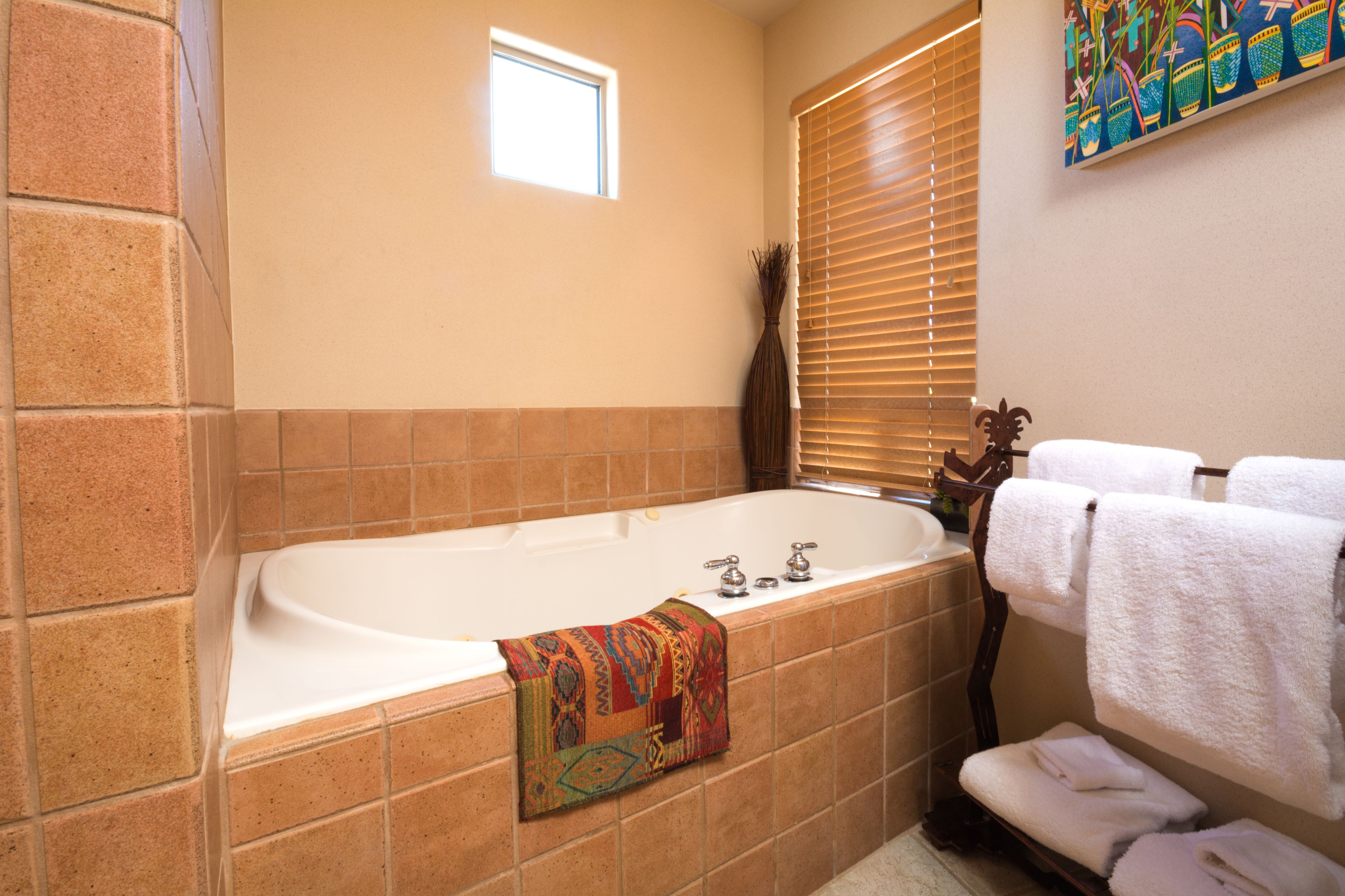 luxury suite | bathroom | separate bathtub and shower, jetted bath, free toiletries, hair dryer
