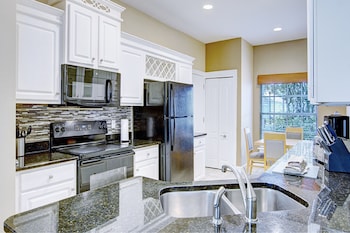 Family House, 3 Bedrooms, Non Smoking, Resort View | Private kitchen | Full-size fridge, microwave, oven, stovetop at Summer Bay Orlando by Exploria Resorts