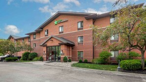 A brick building with a sign reading "Stay America." - Extended Stay America Suites Cleveland Westlake (Westlake)
