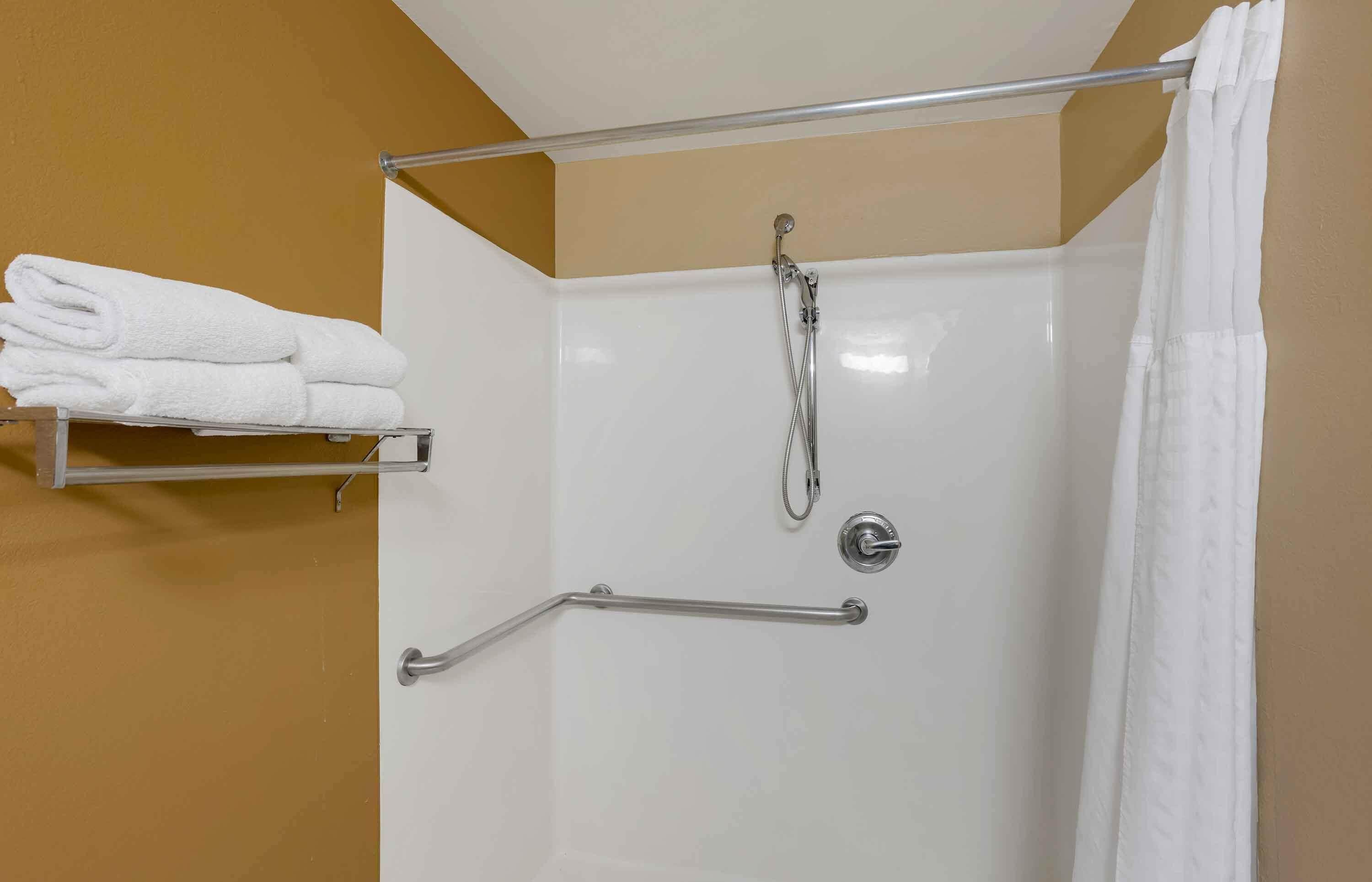 studio, 1 queen bed, accessible, non smoking | bathroom | combined shower/bathtub, free toiletries, hair dryer, towels