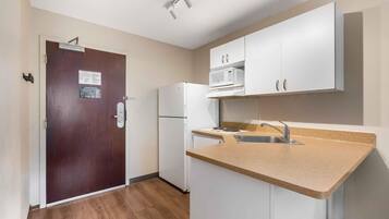 Studio, 1 Queen Bed, Non Smoking | Private kitchen | Full-sized fridge, microwave, stovetop, coffee/tea maker