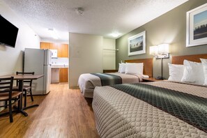 Desk, laptop workspace, free WiFi, bed sheets