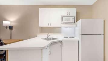 Fridge, microwave, stovetop, coffee/tea maker
