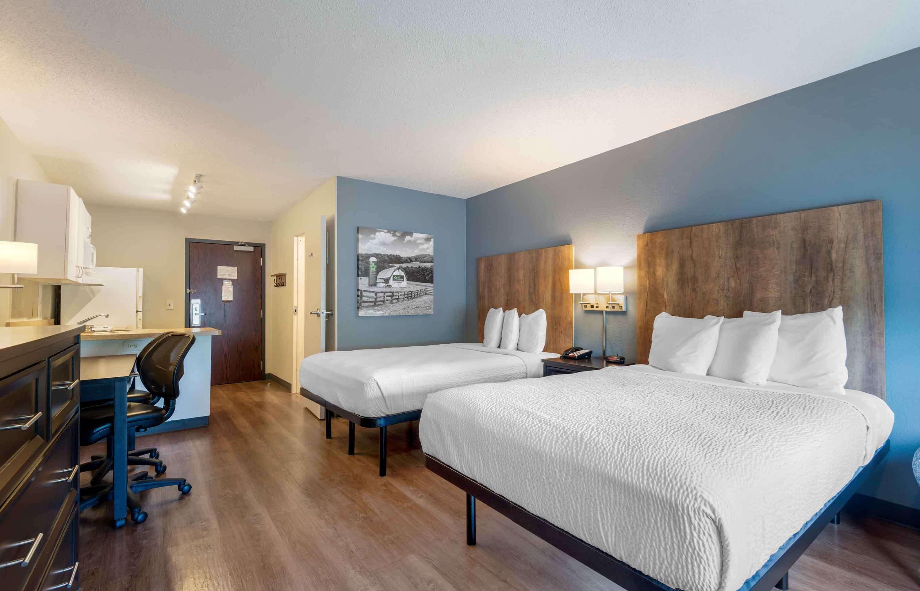 Studio, 2 Double Beds, Non Smoking | Desk, laptop workspace, blackout drapes, iron/ironing board