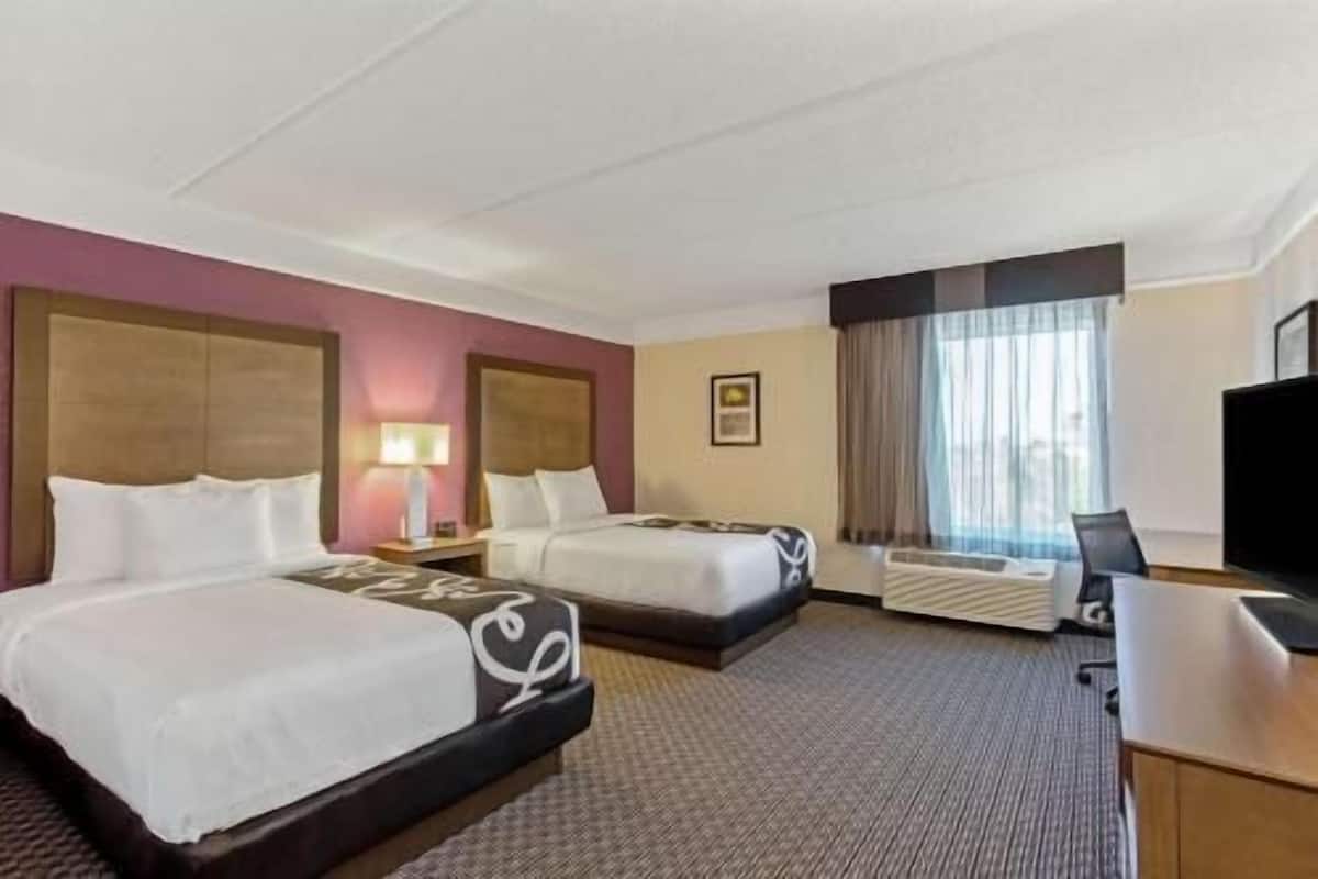Premium bedding, pillowtop beds, desk, laptop workspace