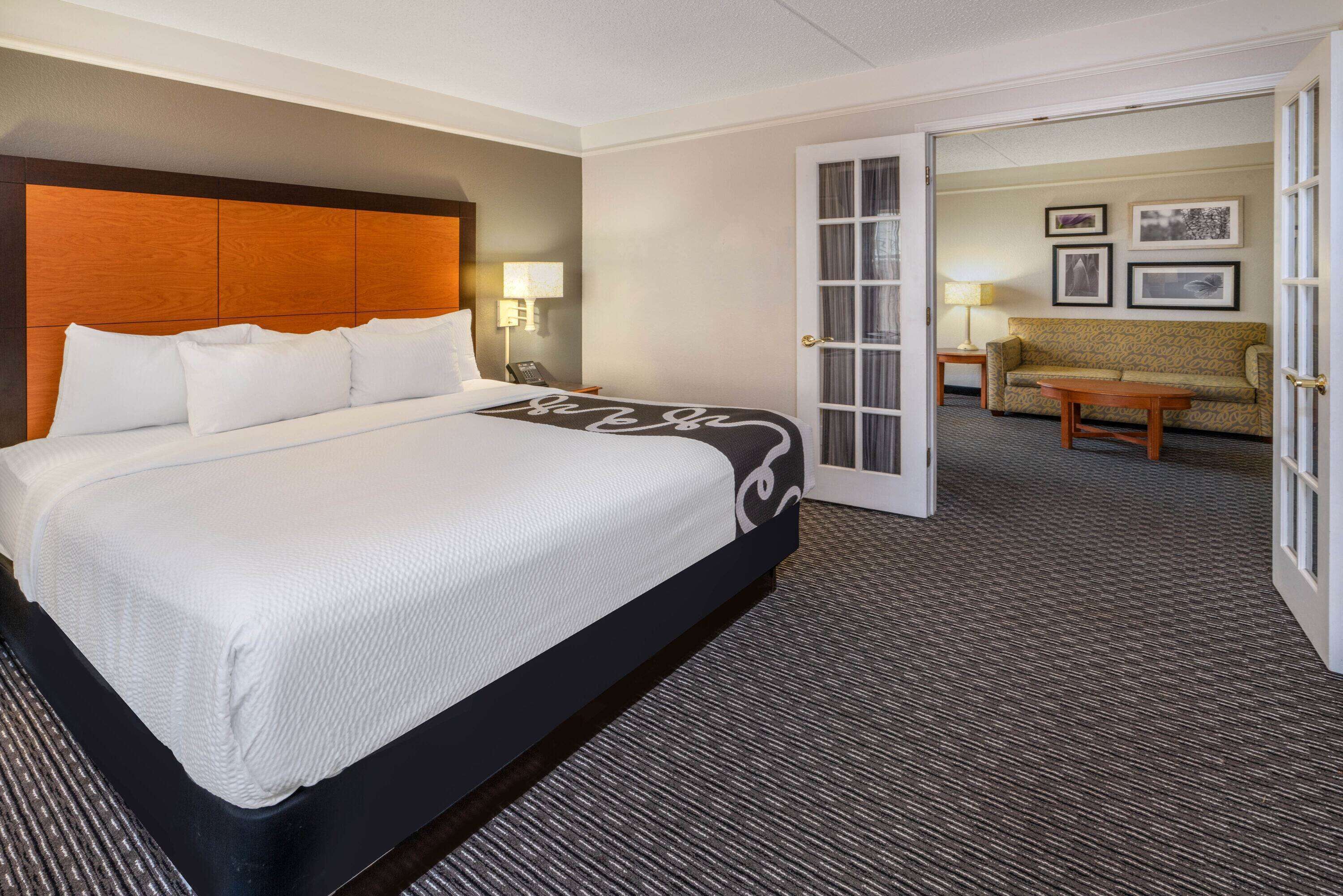 suite, 1 king bed, non smoking | premium bedding, desk, iron/ironing board, free cots/infant beds