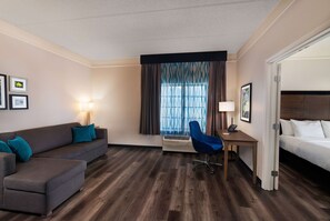 Suite, 1 King Bed, Non Smoking | 1 bedroom, pillowtop beds, desk, iron/ironing board