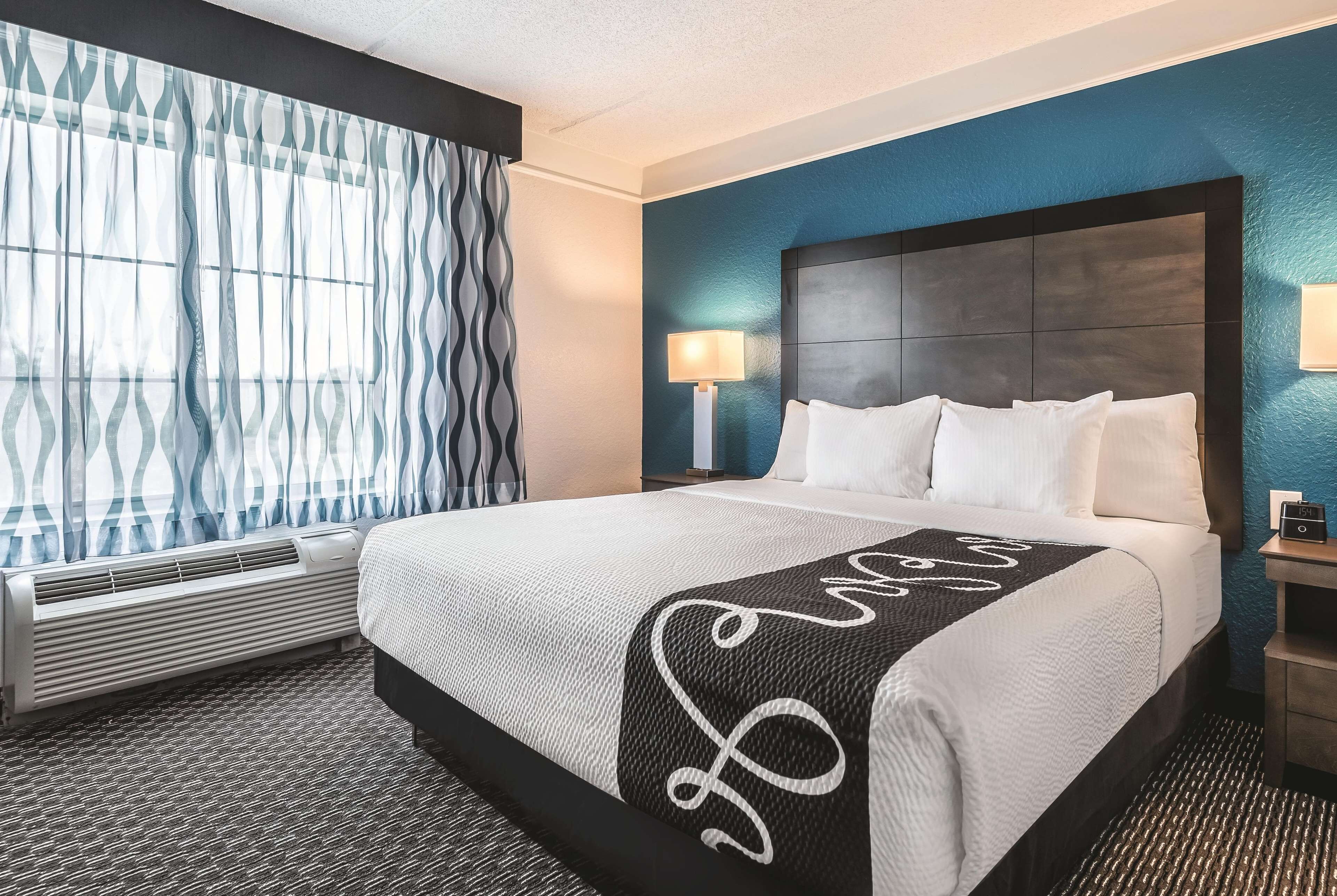 suite, 1 king bed, non smoking | premium bedding, desk, iron/ironing board, free cots/infant beds