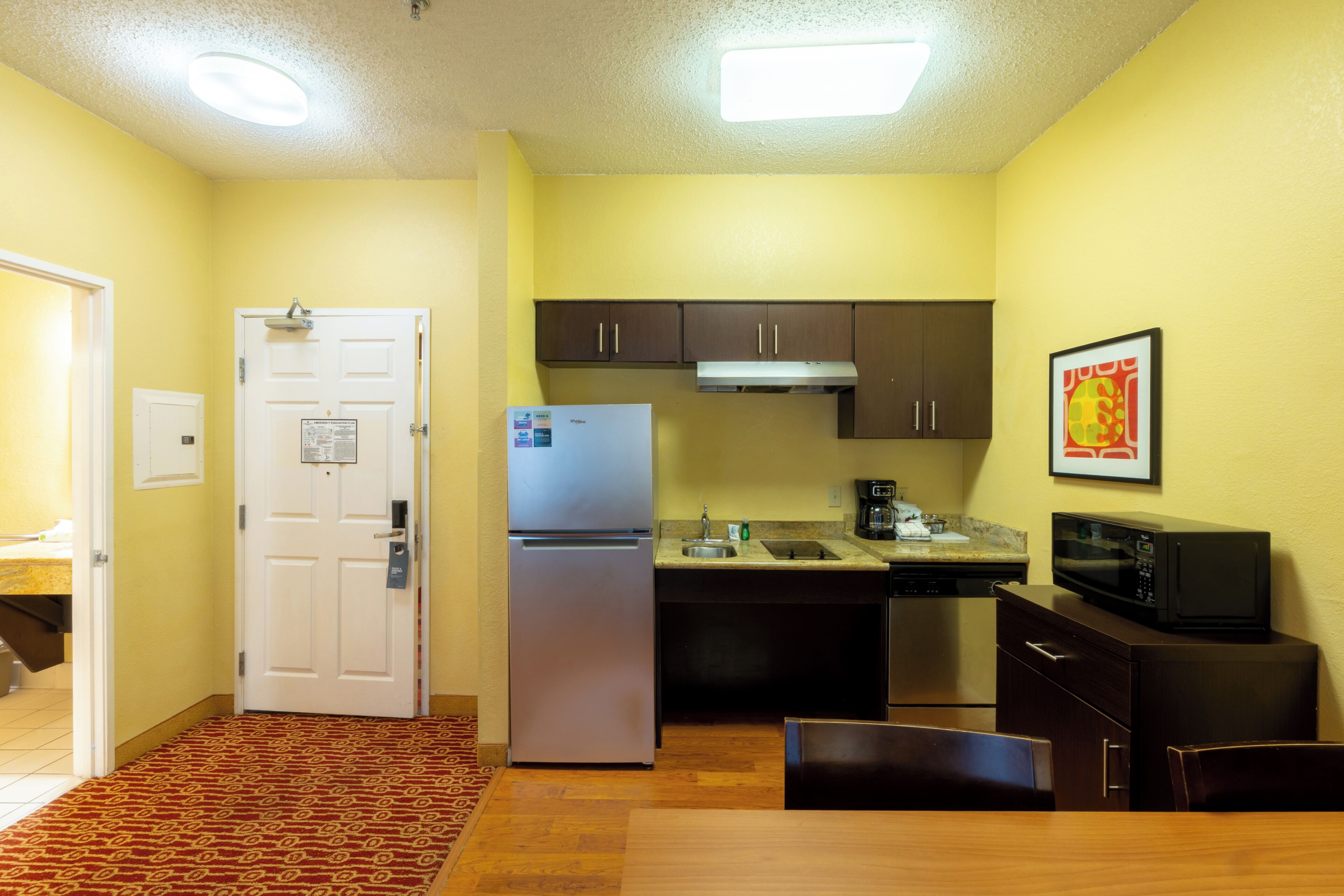 Studio, 1 Queen Bed, Transfer Shower (Mobility Accessible) | Private kitchen | Full-size fridge, microwave, stovetop, coffee/tea maker