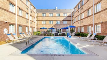 Outdoor pool, open 8:00 AM to 9:30 PM, pool loungers