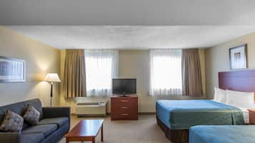 Desk, laptop workspace, iron/ironing board, free cribs/infant beds