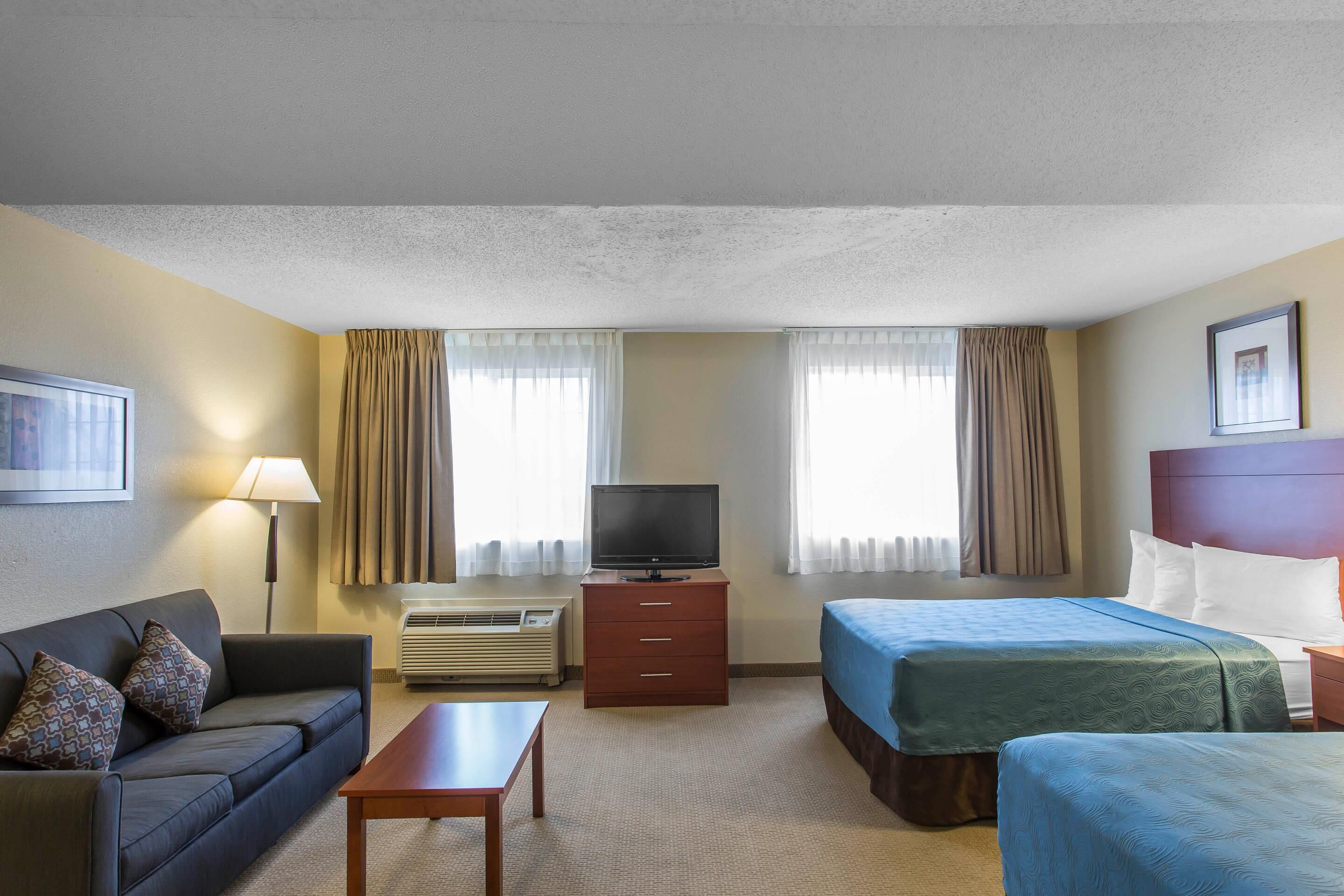 Desk, laptop workspace, iron/ironing board, free cots/infant beds