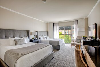 Egyptian cotton sheets, premium bedding, down comforters, pillowtop beds at Woodmark Hotel and Still Spa