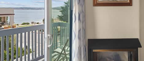 Room, 1 King Bed, Fireplace, Partial Ocean View | Premium bedding, down comforters, desk, laptop workspace