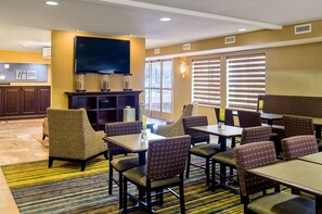 Relax in comfort with seating areas and a flat-screen TV.