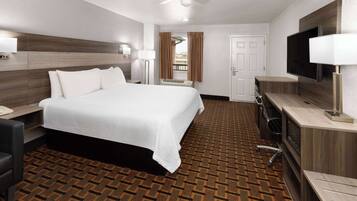 Desk, laptop workspace, blackout drapes, free cribs/infant beds