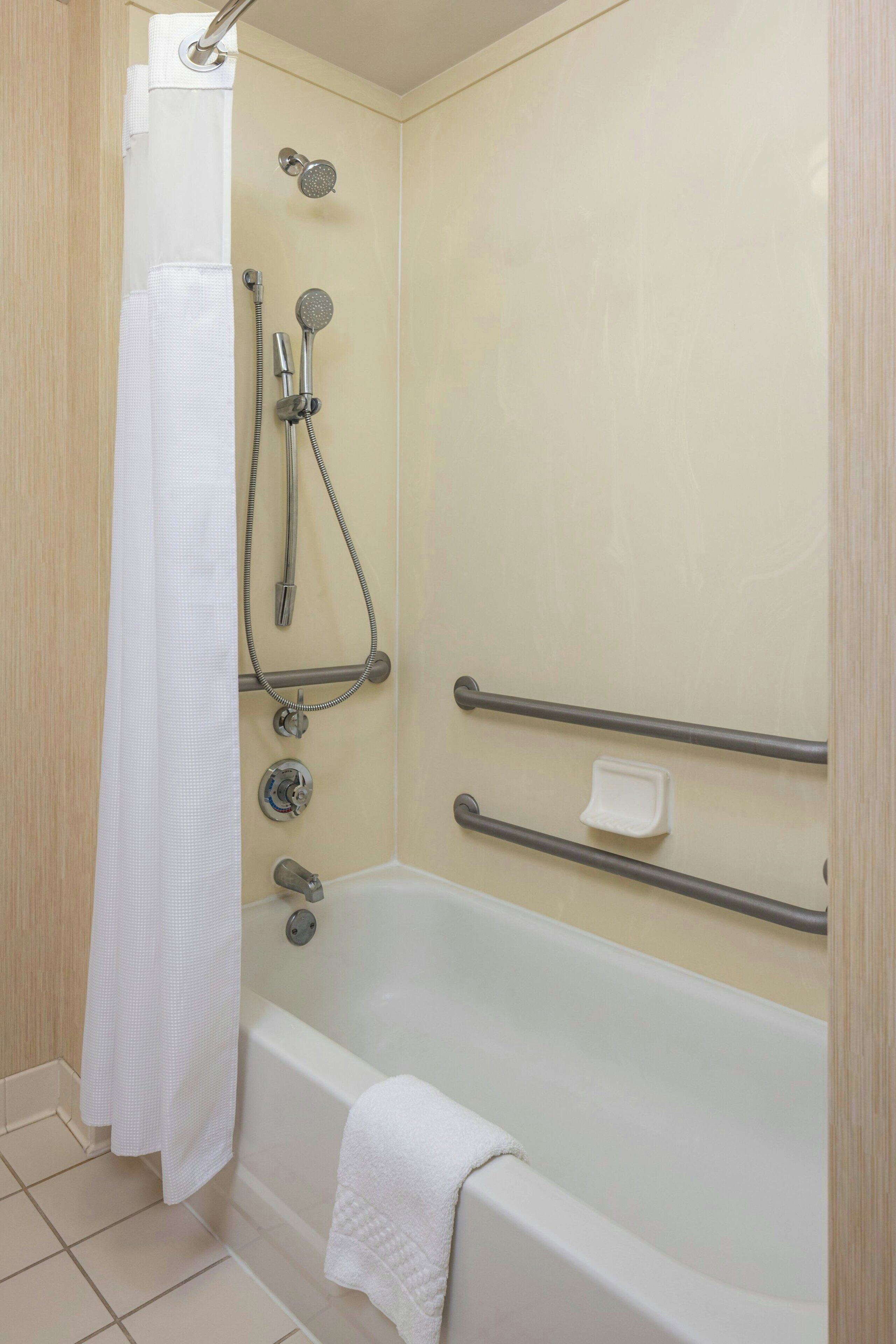 combined shower/bathtub, free toiletries, hair dryer, towels