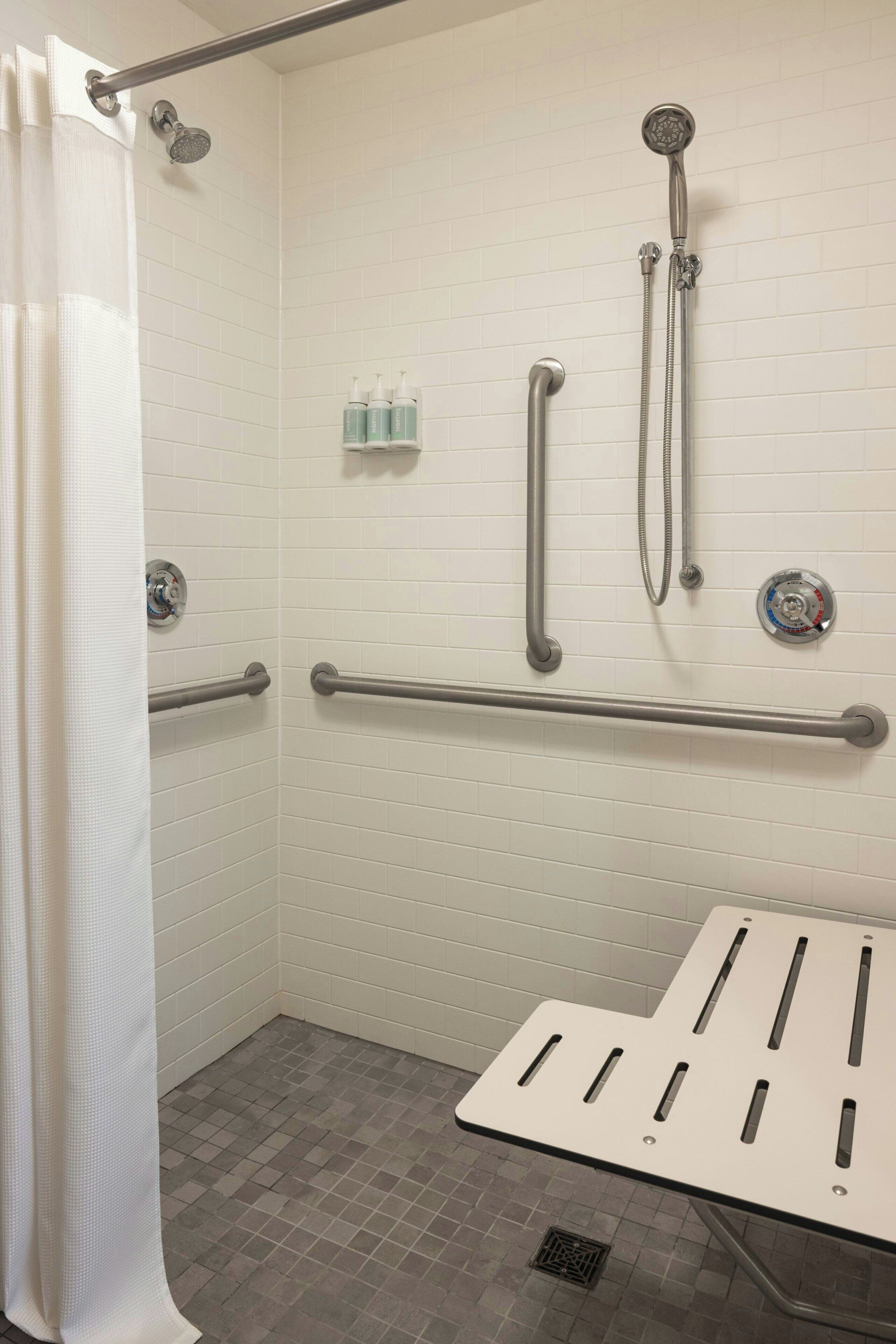 combined shower/bathtub, free toiletries, hair dryer, towels