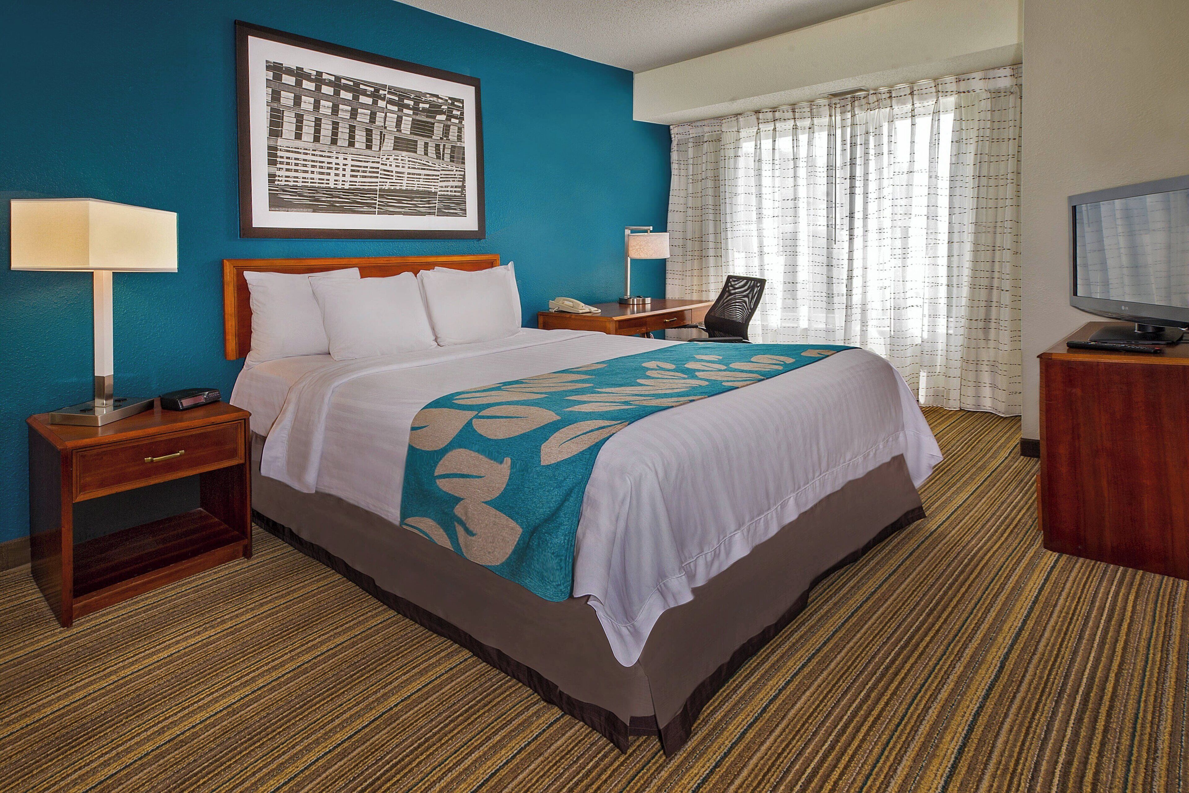 suite, 2 bedrooms | 1 bedroom, laptop workspace, blackout curtains, iron/ironing board