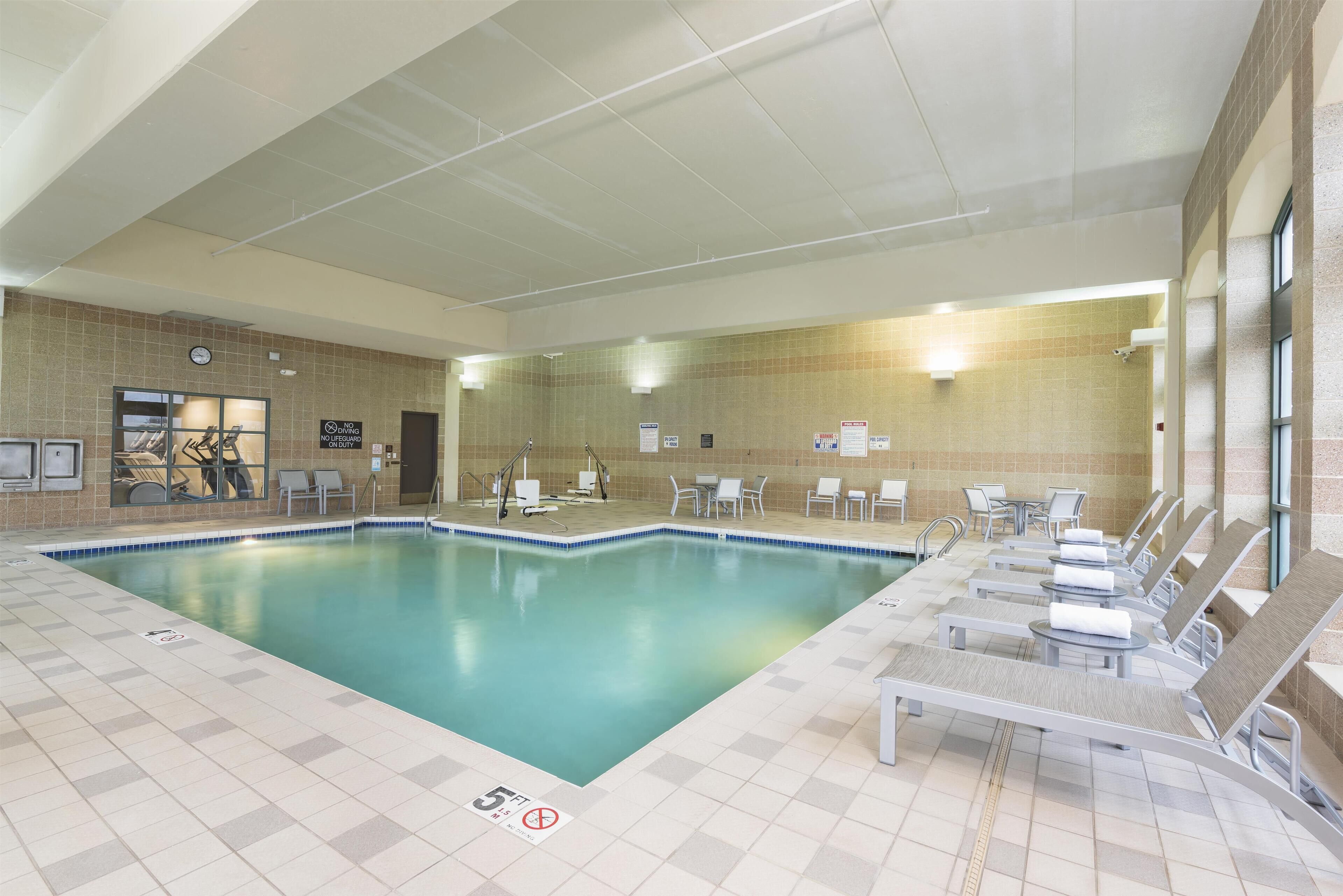 Indoor pool, open 7:00 AM to 11:00 PM, sun loungers