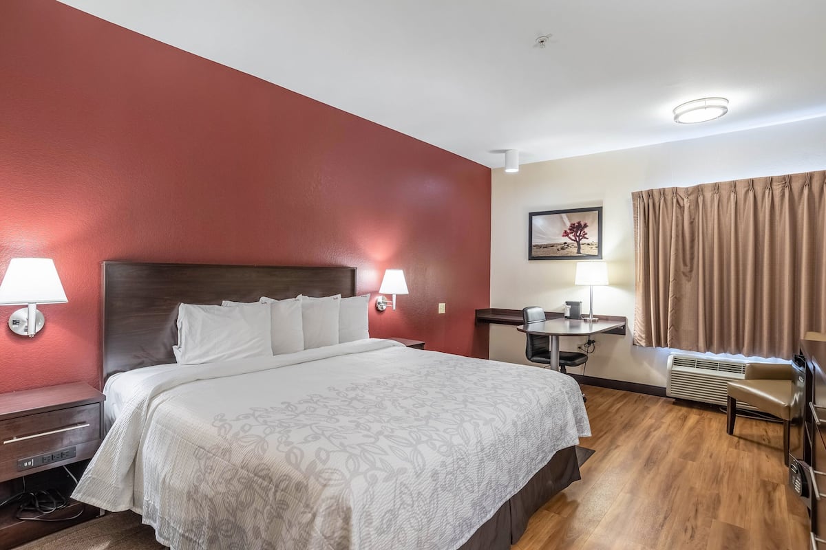 Desk, laptop workspace, blackout curtains, free WiFi