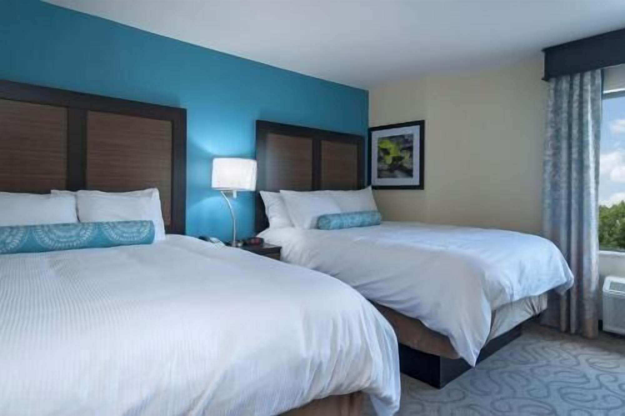 Pillowtop beds, desk, laptop workspace, blackout drapes