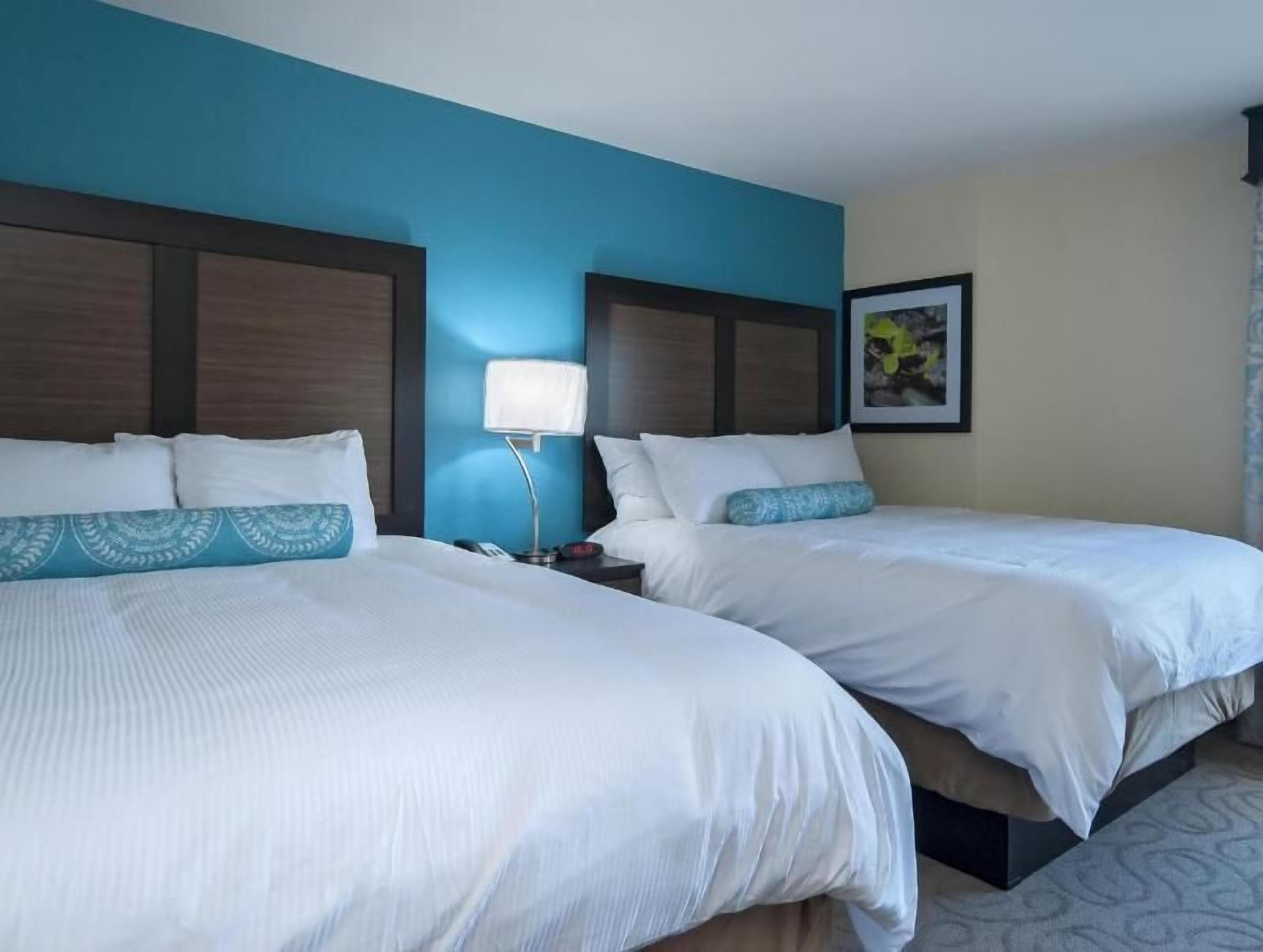 Pillowtop beds, desk, laptop workspace, blackout drapes