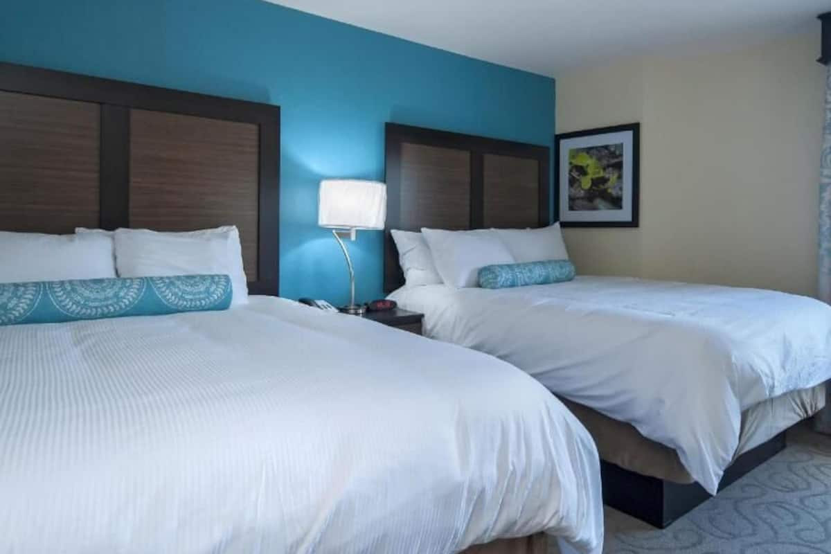 Pillowtop beds, desk, laptop workspace, blackout drapes