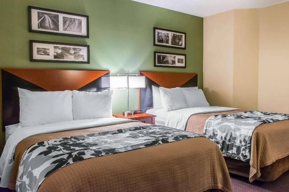 Pillow-top beds, desk, blackout curtains, iron/ironing board
