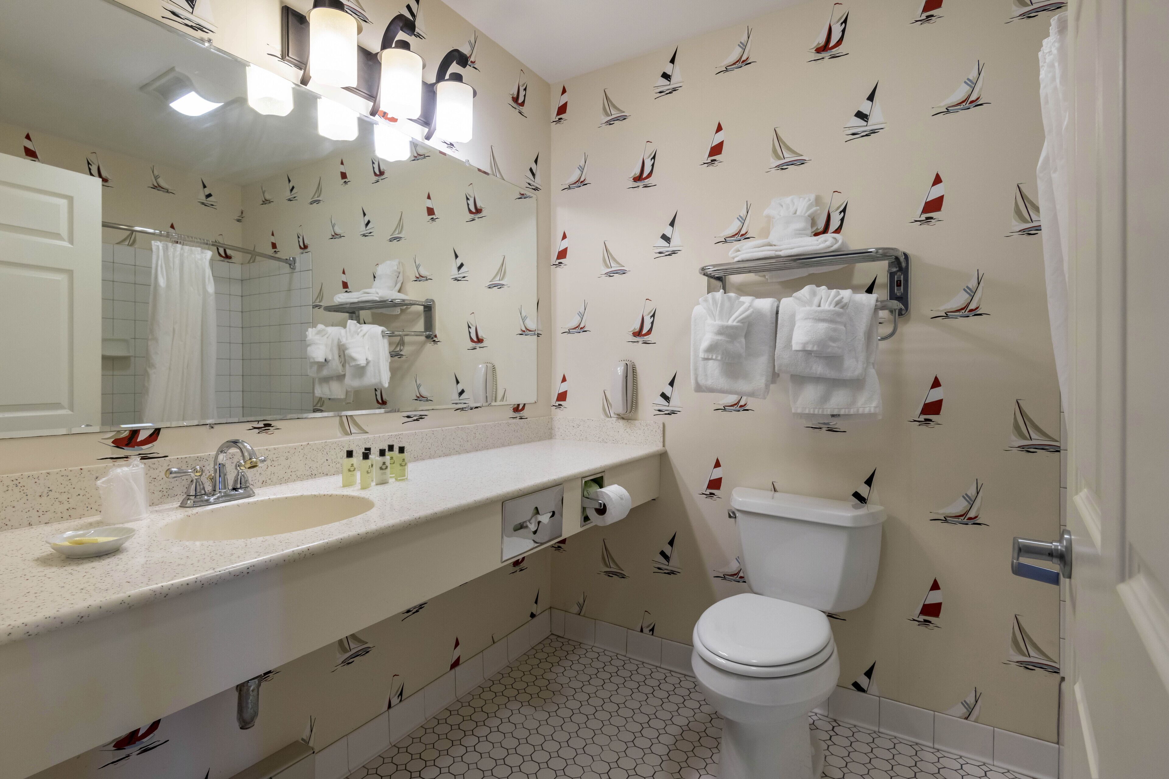 shower, hydromassage showerhead, designer toiletries, hair dryer