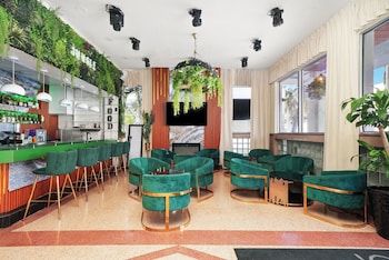 Sitting area in hotel lobby at Chesterfield Hotel & Suites