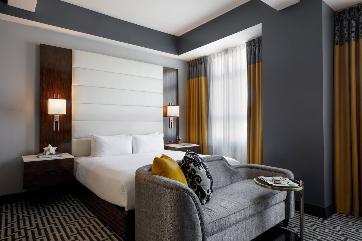 Egyptian cotton sheets, premium bedding, minibar, in-room safe
