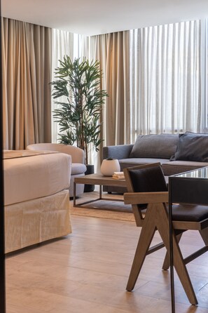 Deluxe Suite, 1 King Bed | 1 bedroom, premium bedding, in-room safe, desk