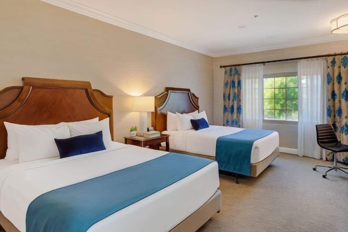 Premium bedding, down duvets, pillow-top beds, in-room safe