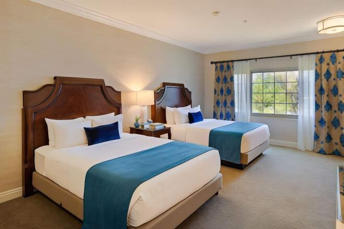 Premium bedding, down duvets, pillow-top beds, in-room safe