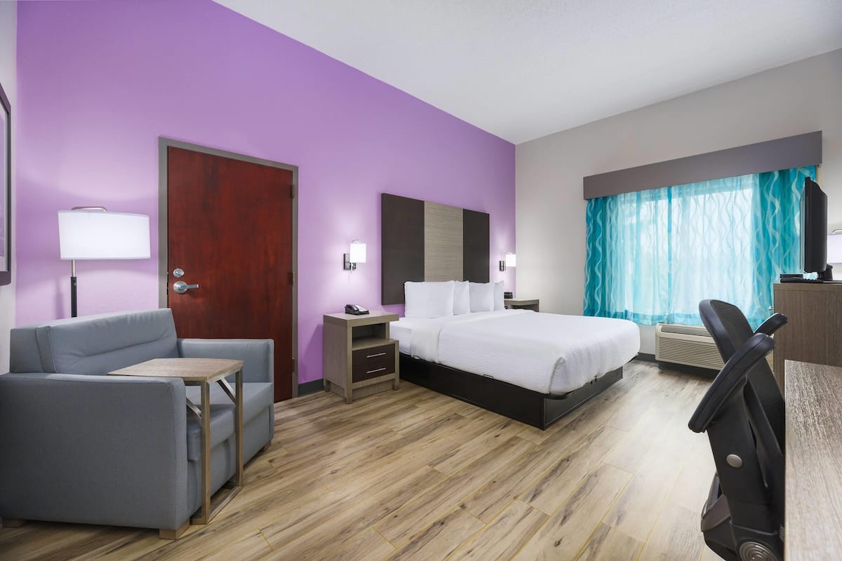 Premium bedding, desk, laptop workspace, free WiFi