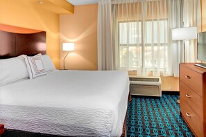 Premium bedding, individually furnished, desk, laptop workspace