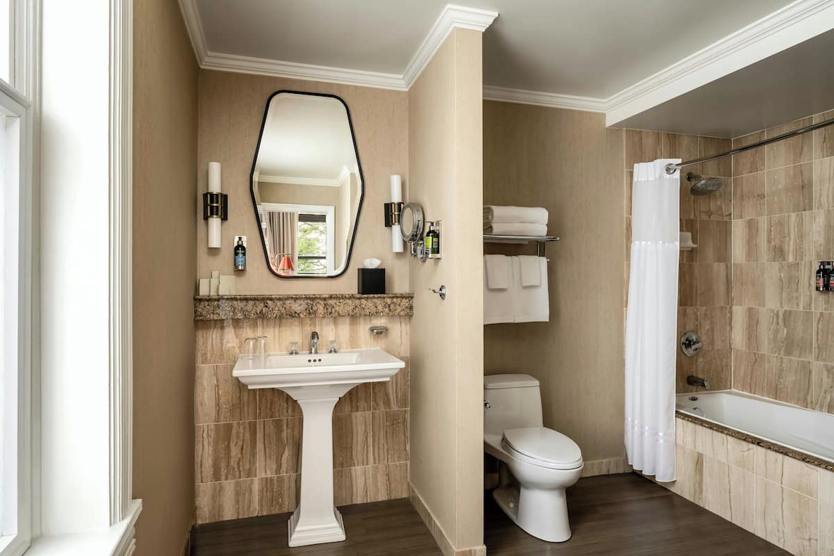 room, 1 king bed (larger lusso) | bathroom | combined shower/bathtub, designer toiletries, hair dryer, towels