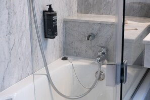 Eco-friendly toiletries, hair dryer, towels