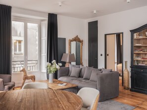 Apartment, 1 Bedroom (Amsterdam - Place Royale - 51m²) | Living area | 43-inch flat-screen TV with satellite channels, TV