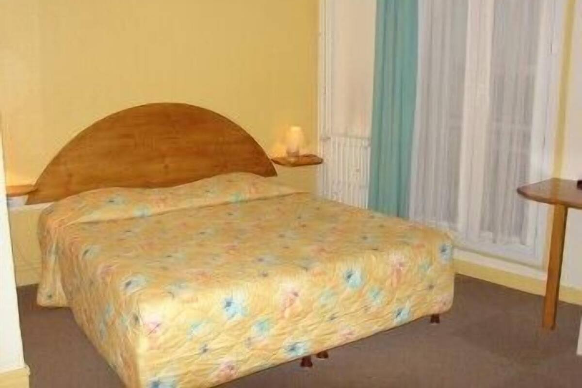 Desk, blackout curtains, iron/ironing board (on request)