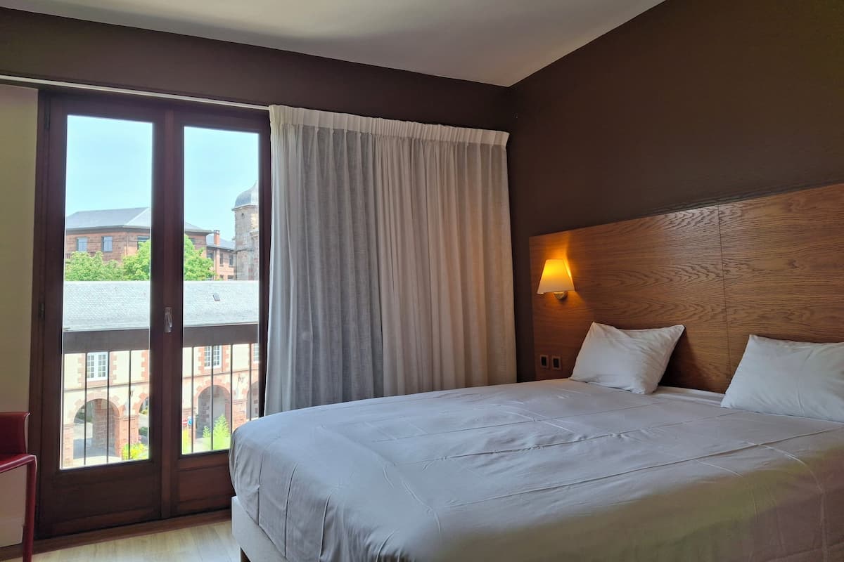 Superior Double Room | Desk, blackout drapes, iron/ironing board (on request), WiFi (free)