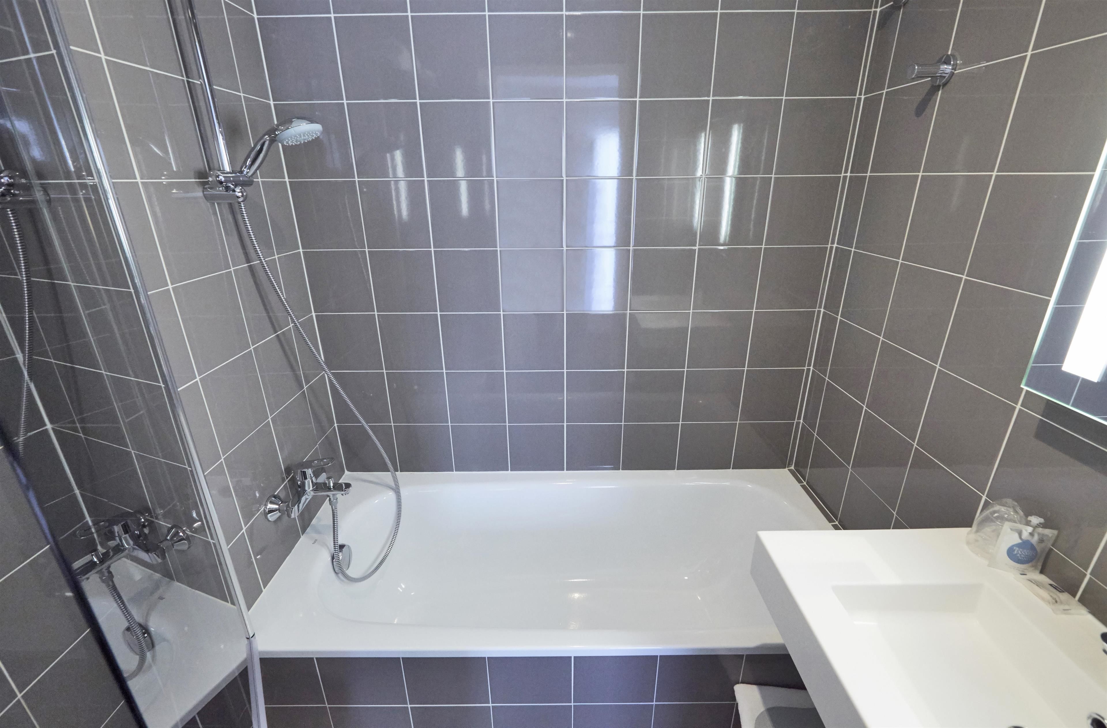 eco-friendly toiletries, hair dryer, towels