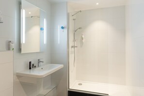 Shower, eco-friendly toiletries, hair dryer, towels