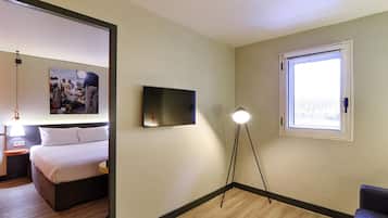 Desk, blackout drapes, soundproofing, iron/ironing board