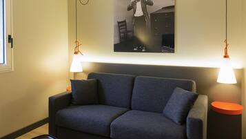 Desk, blackout drapes, soundproofing, iron/ironing board