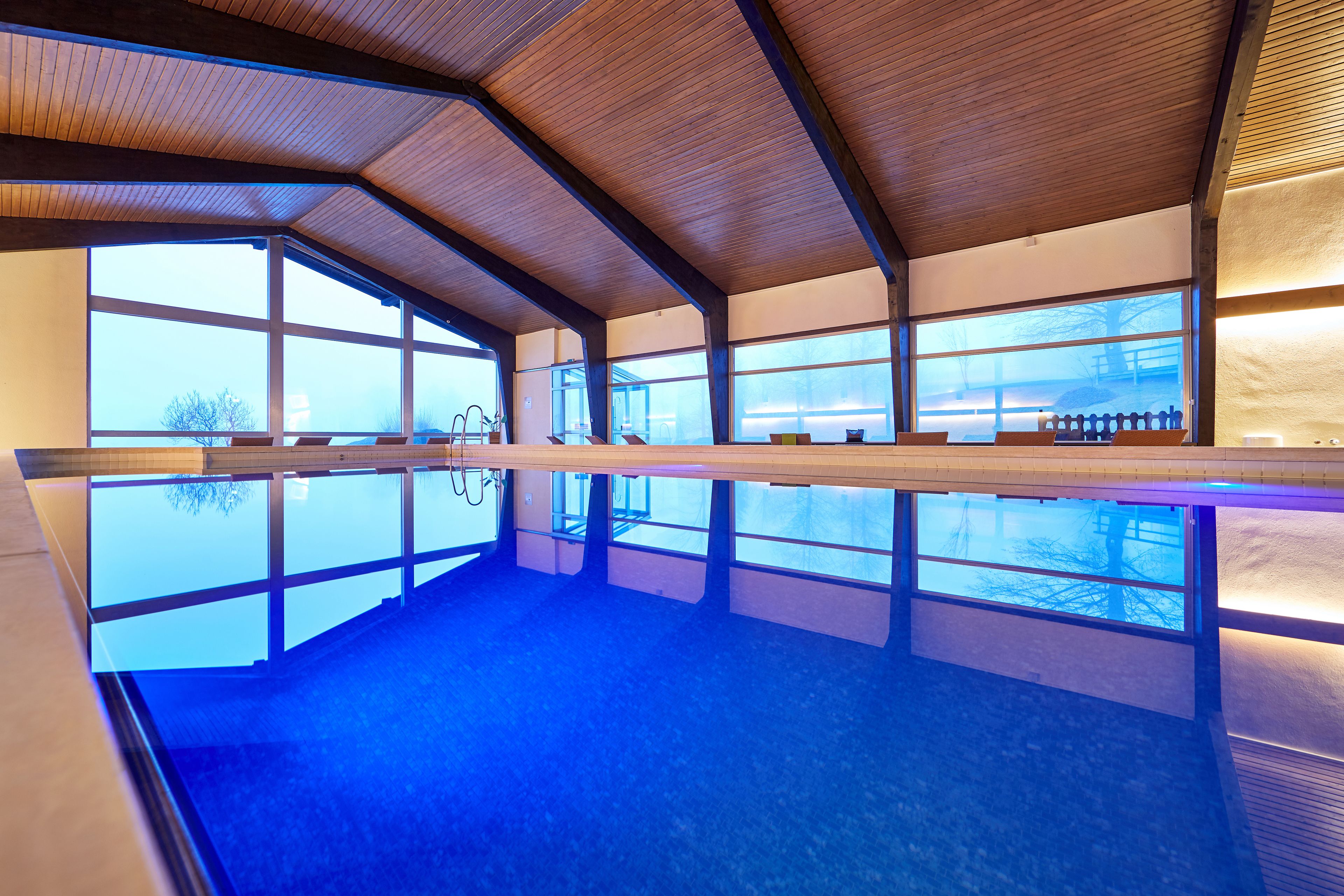 indoor pool, open 7:00 am to 10:00 pm, pool loungers