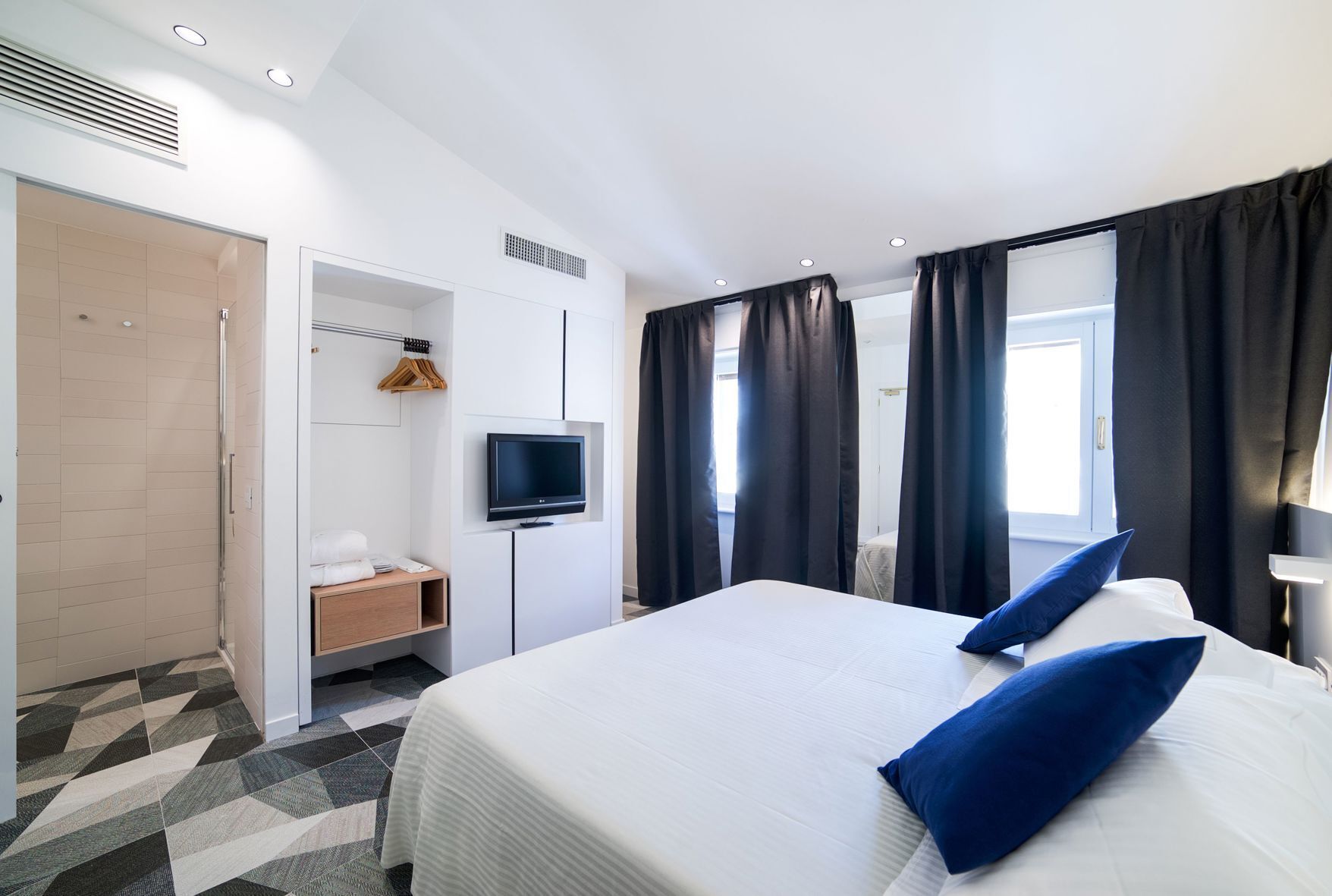 Biancheria da letto ipoallergenica, minibar, cassaforte in camera