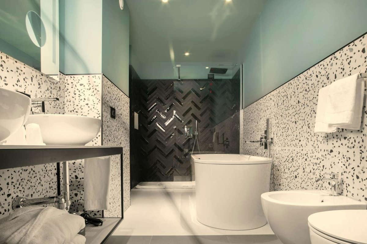 deluxe room, 1 queen bed | bathroom | free toiletries, hair dryer, bathrobes, bidet