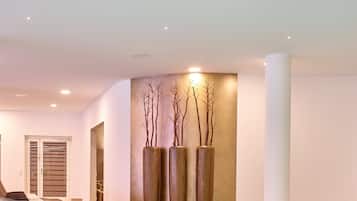 Indoor pool, outdoor pool, pool umbrellas, pool loungers